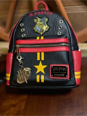 NWOT Pristine Harry Potter Loungefly Backpack with Large Double Sided Charm
